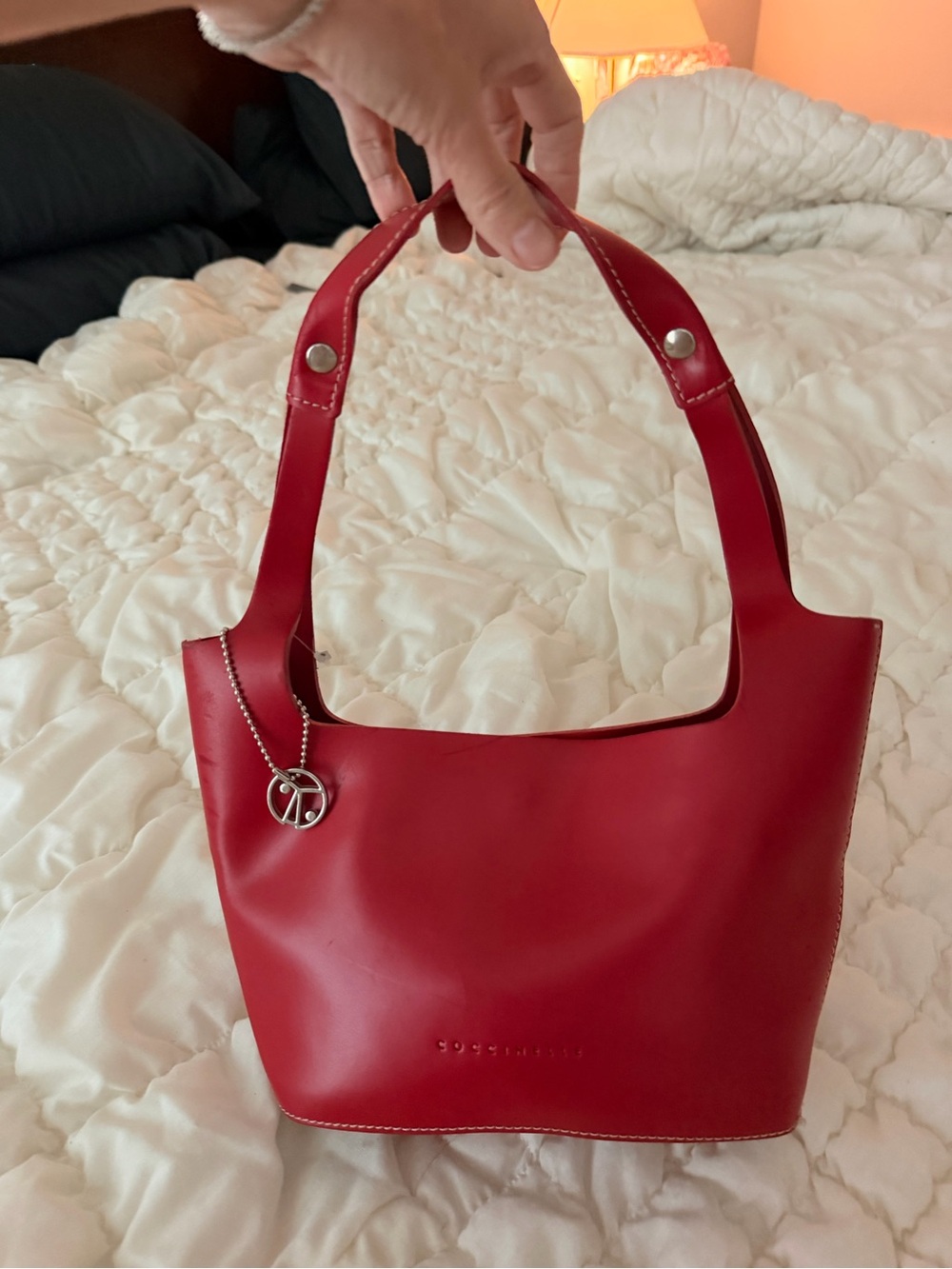 Sleek Red Leather Shoulder Bag with Silver Charm